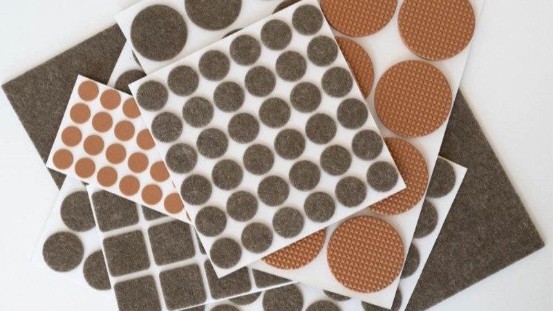 Adhesive felt furniture pads, which can be used for a DIY home fragrance hack by adding essential oils to make small spaces like drawers smell amazing.